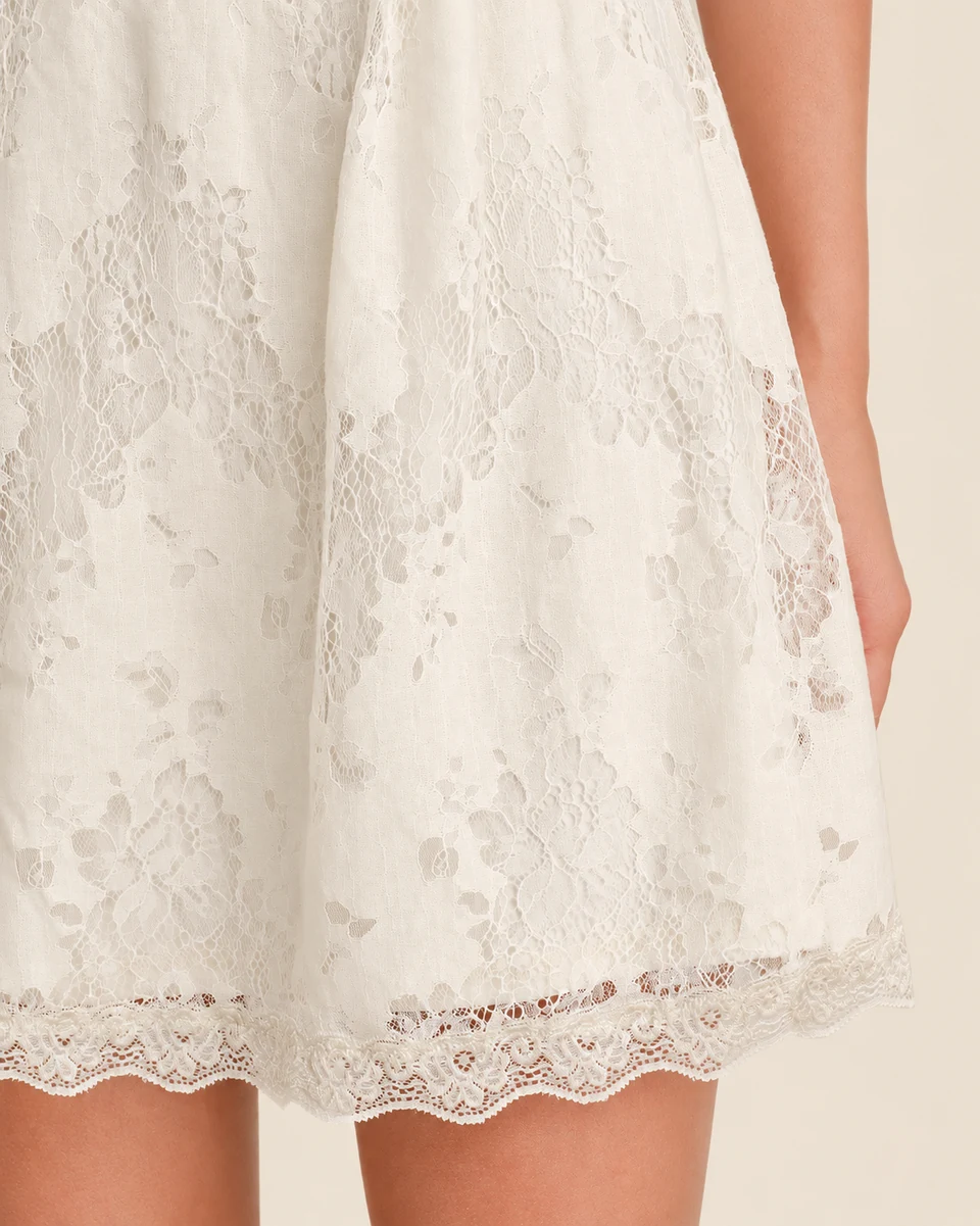 Vivienne Puff-Sleeve Mini Dress — Apricot — hem detail